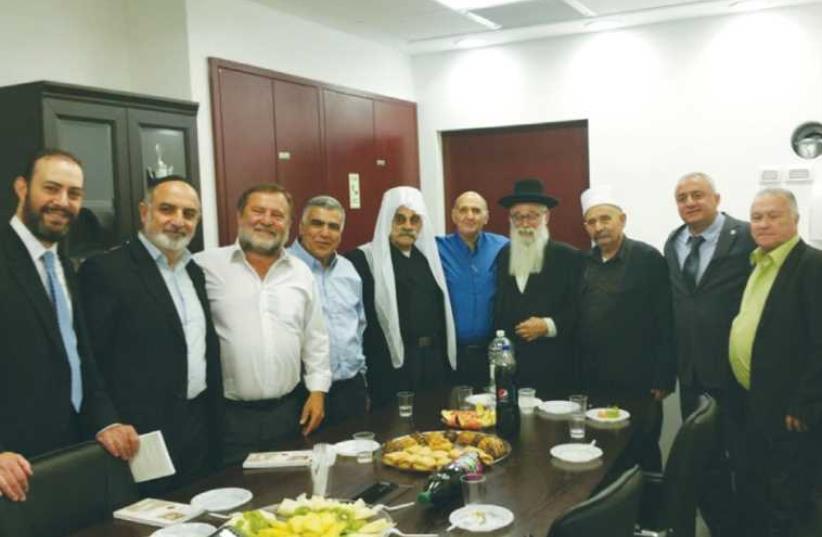 JEWS AND DRUSE attend the launch of the Brit Haim NGO in Jerusalem’s Har Nof neighborhood (photo credit: Courtesy)