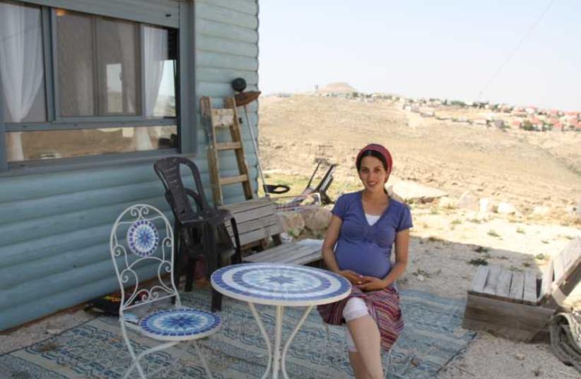 Tehila Makover outside her home in the West Bank outpost of Tekoa D.  (photo credit: TOVAH LAZAROFF)