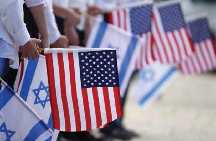 Israel US flags (photo credit: REUTERS)