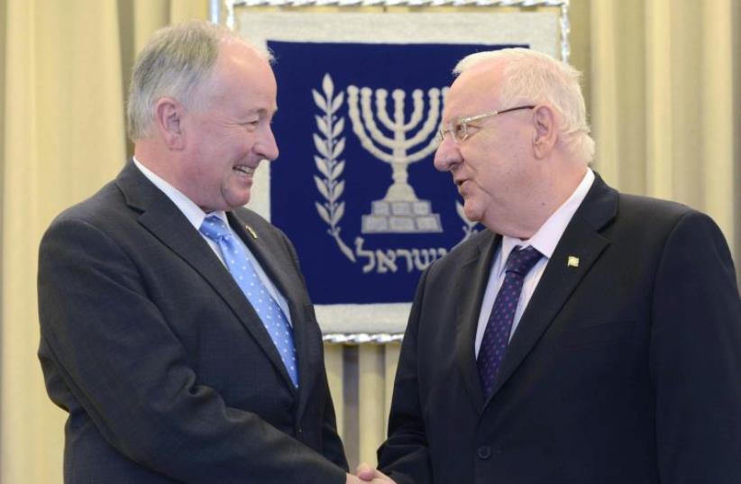 President Rivlin with Canadian Foreign Minister Robert Nicholson (photo credit: Mark Neiman/GPO)