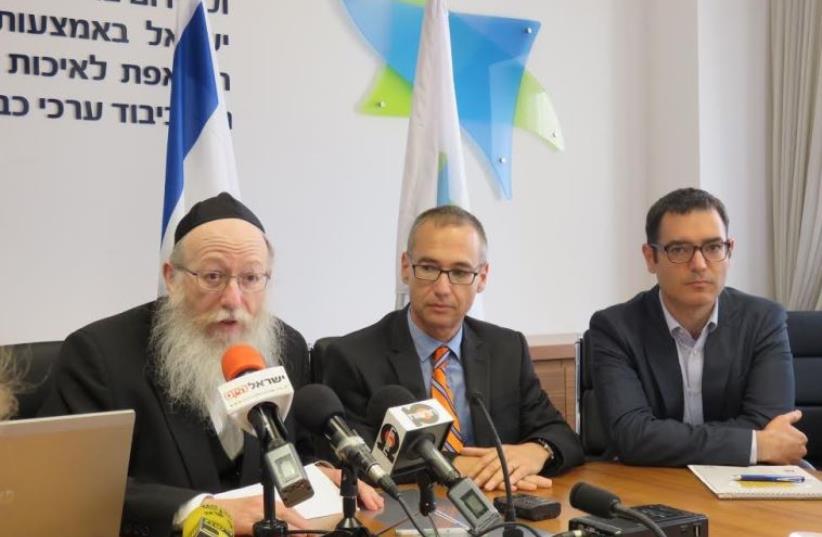 From left - Deputy Health Minister MK Ya’acov Litzman, Prof. Arnon Afek with orange tie and Moshe Bar Siman Tov. (photo credit: JUDY SIEGEL-ITZKOVICH)