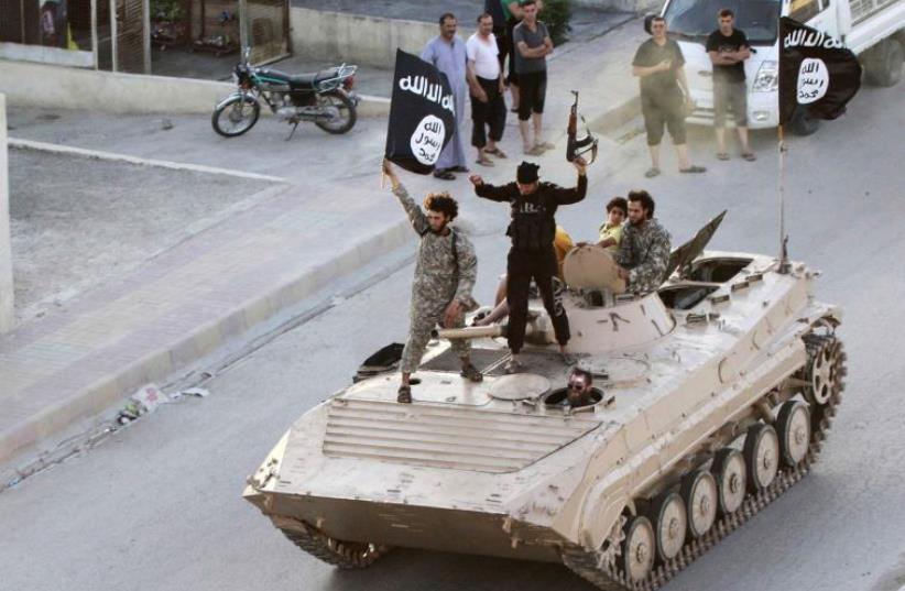 ISIS (photo credit: REUTERS)