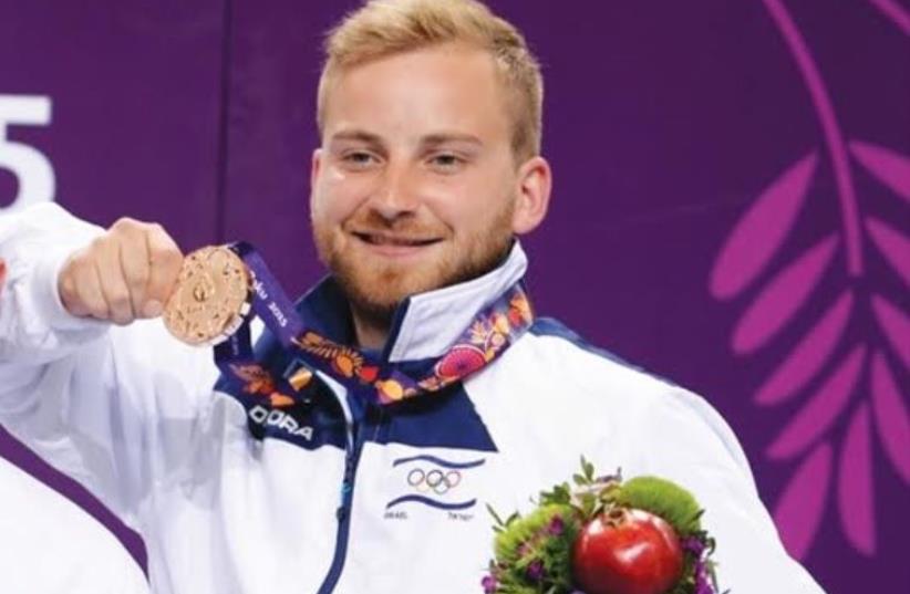 Israeli shooter Sergey Richter wins bronze medal at European Games (photo credit: OCI)