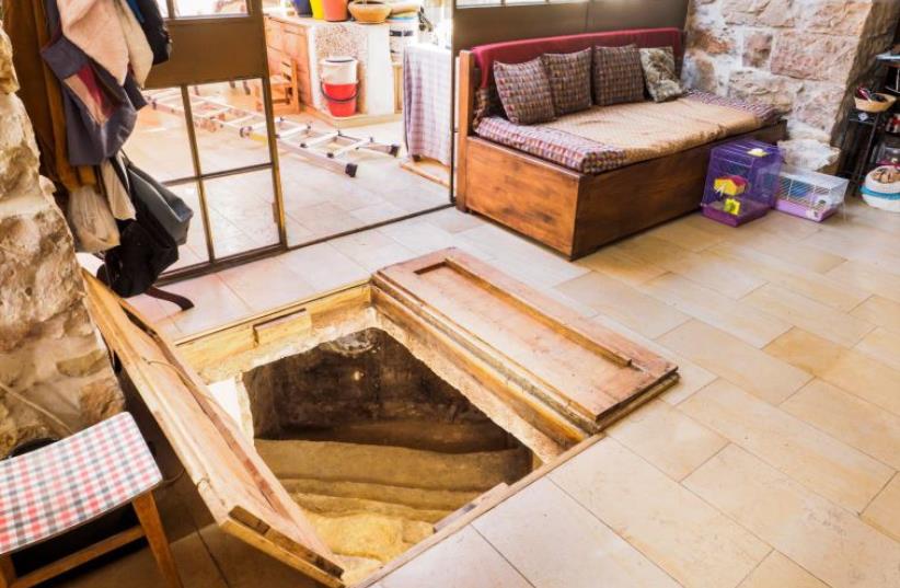 Archeological treasure found underneath Jerusalem livingroom. (photo credit: ASAF PERETZ/ISRAEL ANTIQUITIES AUTHORITY)