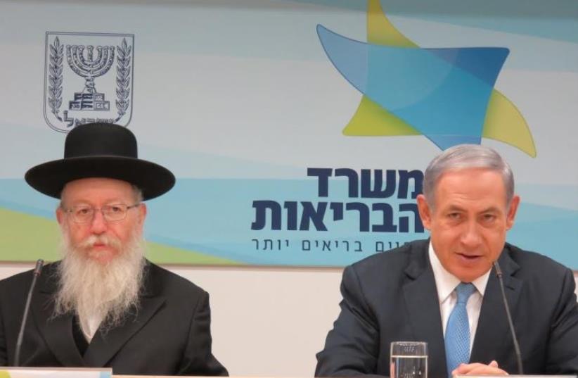 Prime Minister (and, formal) Health Minister Benjamin Netanyahu (R) and Deputy Health Minister MK Ya’acov Litzman (photo credit: JUDY SIEGEL-ITZKOVICH)