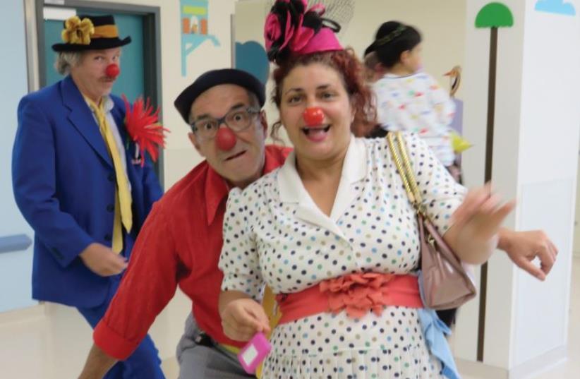Medical Clowns at work.  (photo credit: JUDY SIEGEL-ITZKOVICH)