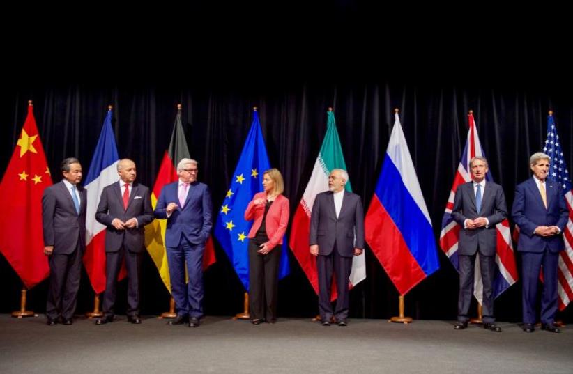 Secretary Kerry Poses for a Group Photo With Fellow EU, P5+1 Foreign Ministers and Iranian Foreign Minister Zarif After Reaching Iran Nuclear Deal (photo credit: STATE DEPARTMENT PHOTO)