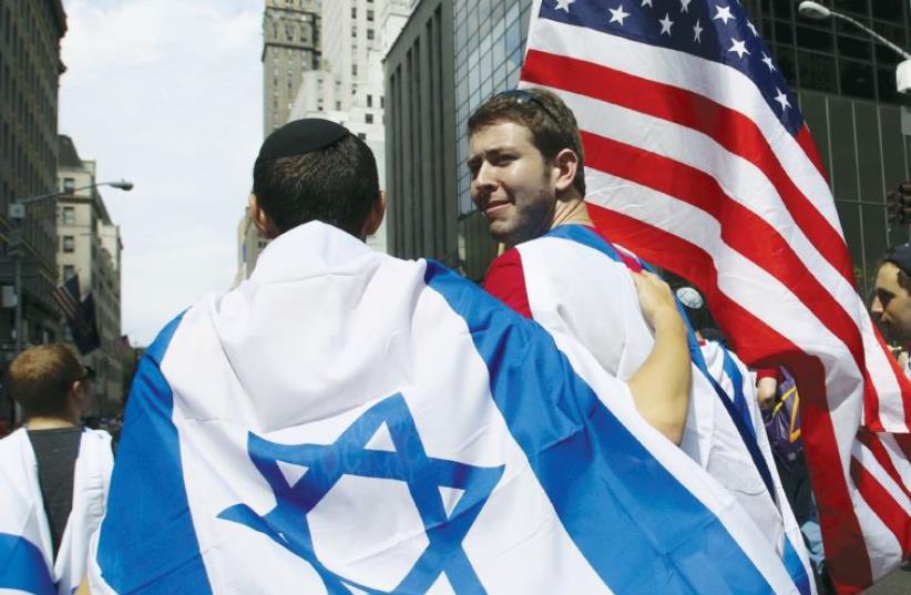 People take part in the 51st annual Israel parade in New York in May. (photo credit: EDUARDO MUNOZ / REUTERS)
