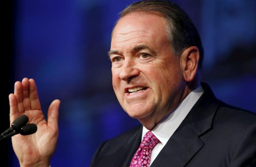 US Republican presidential candidate Mike Huckabee speaks to the 42nd annual meeting of the American Legislative Exchange Council in San Diego (photo credit: REUTERS)