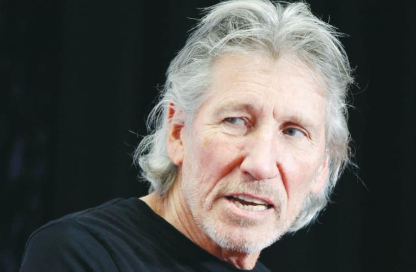 Former Pink Floyd leader Roger Waters speaks to the media in 2012. Some of his best friends are Jewish. (photo credit: CARLO ALLEGRI/REUTERS)