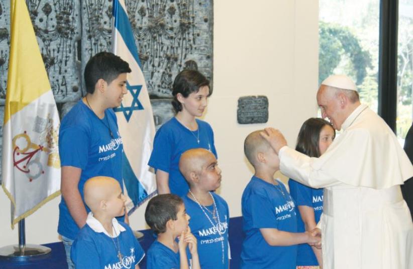 Pope Francis blesses seven Make-A-Wish children during his visit to Israel. (photo credit: Courtesy)