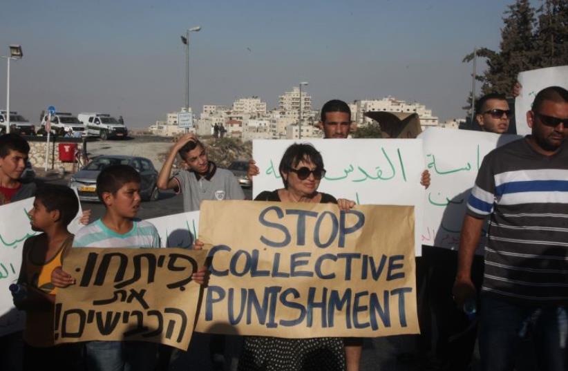 Protesters in Isawiya, east Jerusalem (photo credit: MARC ISRAEL SELLEM)