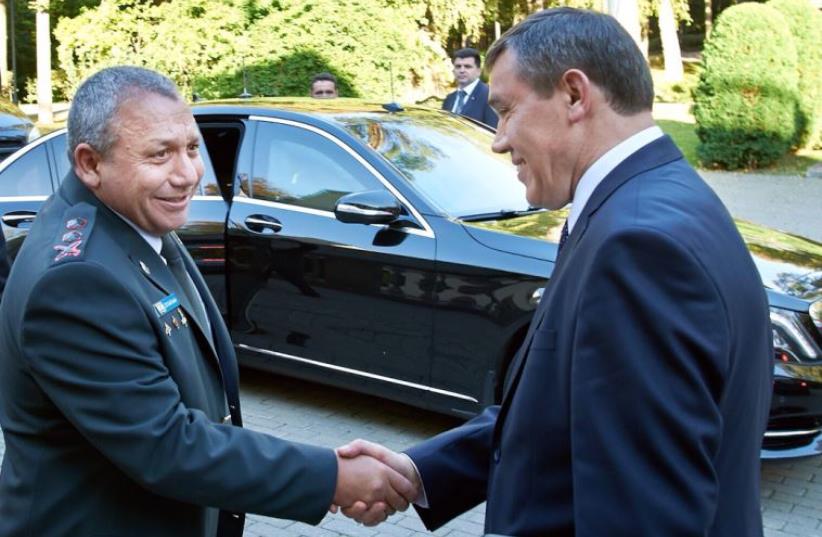 IDF Chief of Staff Lt.-Gen. Gadi Eisenkot (left) with Chief of the General Staff of the Russian Army General Valery Vasilevich Gerasimov, September 21, 2015.  (photo credit: IDF)