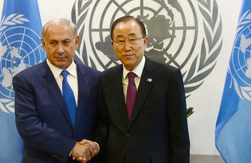 Prime Minister Benjamin Netanyahu (L) and UN Secretary-General Ban Ki-moon meet in New York (photo credit: AVI OHAYON - GPO)