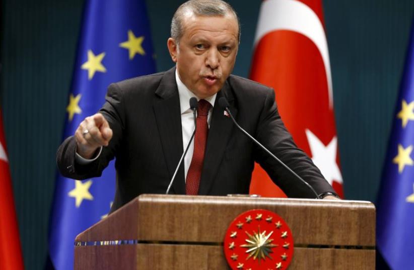 Turkish President Recep Tayyip Erdogan speaks during a news conference in Ankara (photo credit: REUTERS)