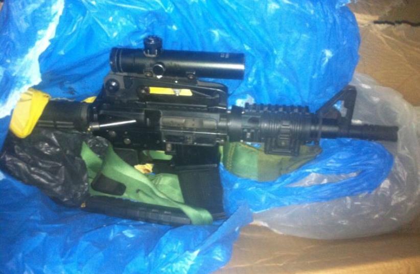 M-16 rifle used by terrorists in murder of Eitam and Naama Henkin. (photo credit: SHIN BET)