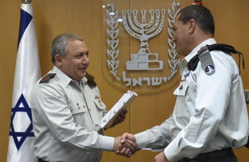 Newly appointed IDF Southern Command chief Maj.-Gen. Eyal Zamir (right) shakes hands with IDF Chief of Staff Lt.-Gen. Gadi Eisenkot. (photo credit: IDF SPOKESMAN’S UNIT)