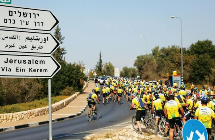 Cyclists from around the globe participate in last year’s Wheels of Love ride (photo credit: HAGAI SHMUELI)