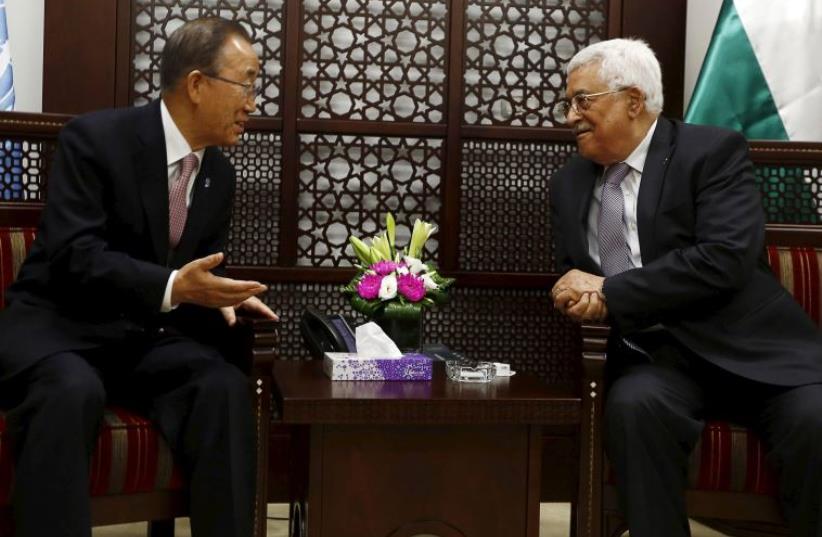Palestinian Authority President Mahmoud Abbas (R) meets UN Secretary-General Ban Ki-moon in Ramallah October 21, 2015.  (photo credit: REUTERS)