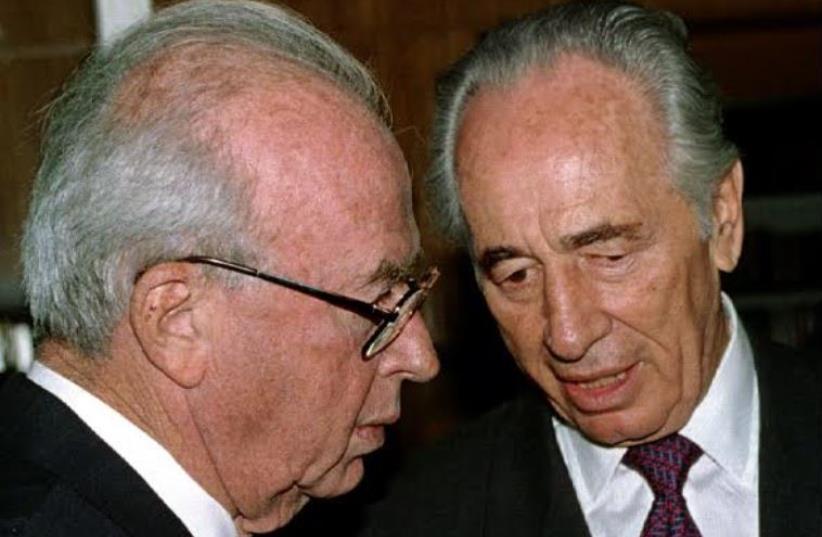 Yitzhak Rabin (left) with Shimon Peres  (photo credit: REUTERS)