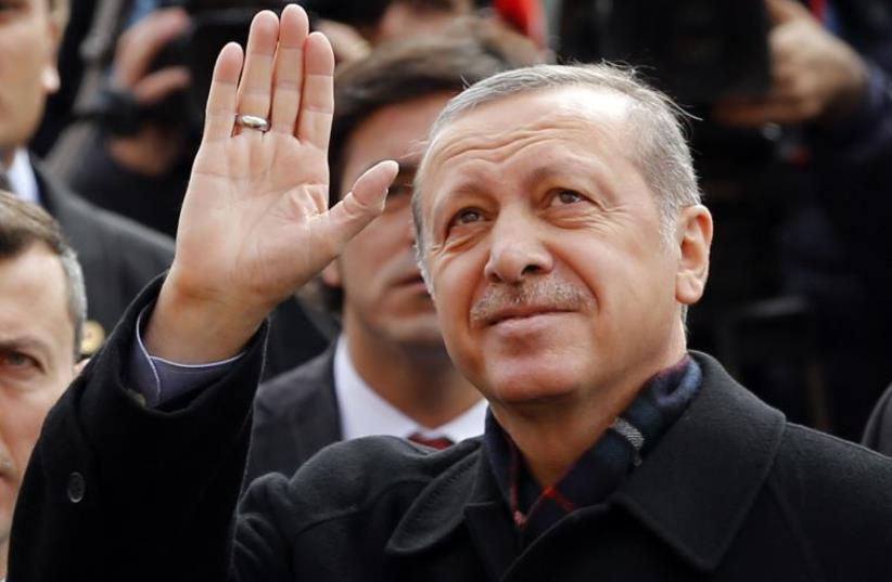 Turkish President Tayyip Erdogan greets his supporters (photo credit: REUTERS)