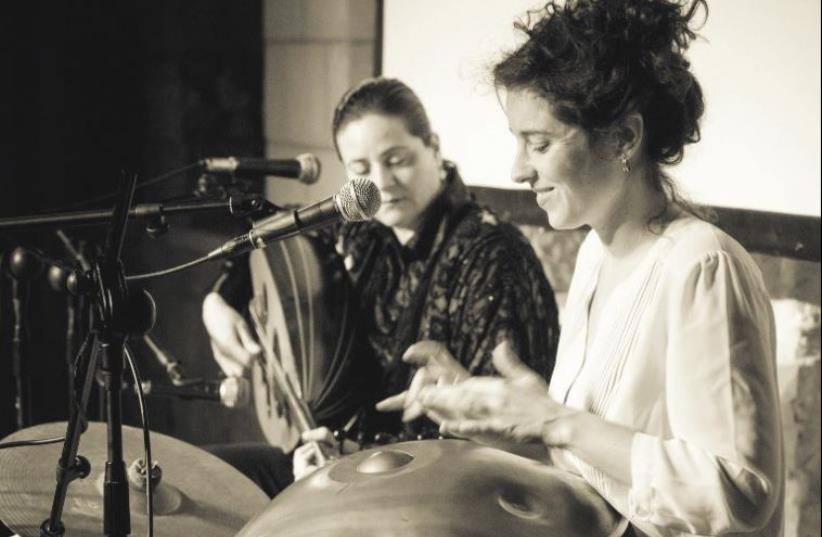 CHRISTIAN ARAB oud player Helen Sebilleh (left) joins forces with Israeli percussionist Liron Meyuhas for the Song of the Oud concert. (photo credit: NOAM FINER)