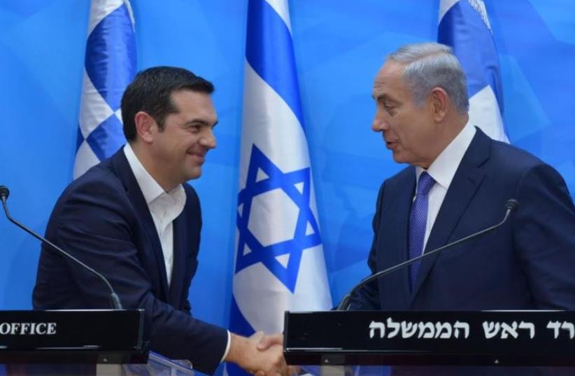 Prime Minister Benjamin Netanyahu (L) and Greek Prime Minister Alexis Tsipras, November 25, 2015 (photo credit: KOBY GIDEON/GPO)