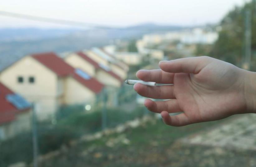 Smoking (photo credit: MARC ISRAEL SELLEM/THE JERUSALEM POST)