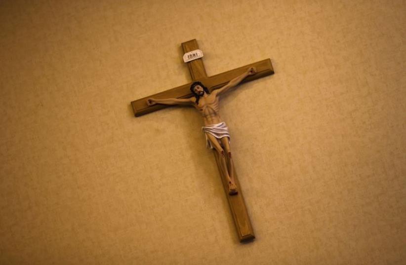 A crucifix is seen on the wall of the Cathedral of the Immaculate Conception in Beijing (photo credit: REUTERS)