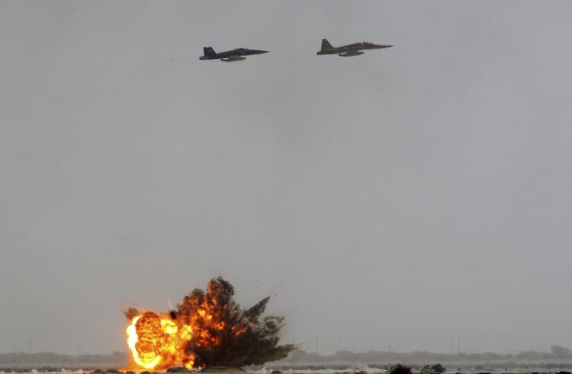 Iranian air force fighter planes drop bombs on targets during manoeuvres in southern Iran June 24, 2009. (photo credit: FARS)