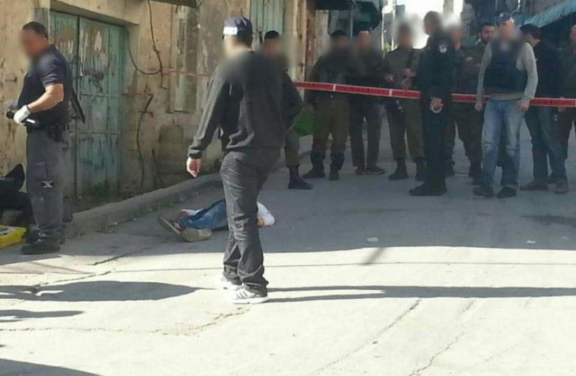 Scene of stabbing attack in Hebron  (photo credit: ELYASHIV TZVIEL)
