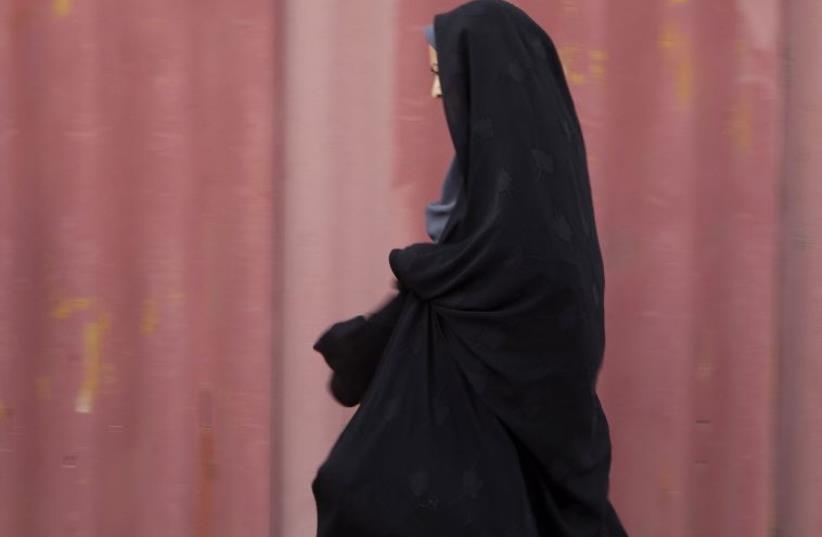 A woman in Iran [Illustrative] (photo credit: REUTERS)