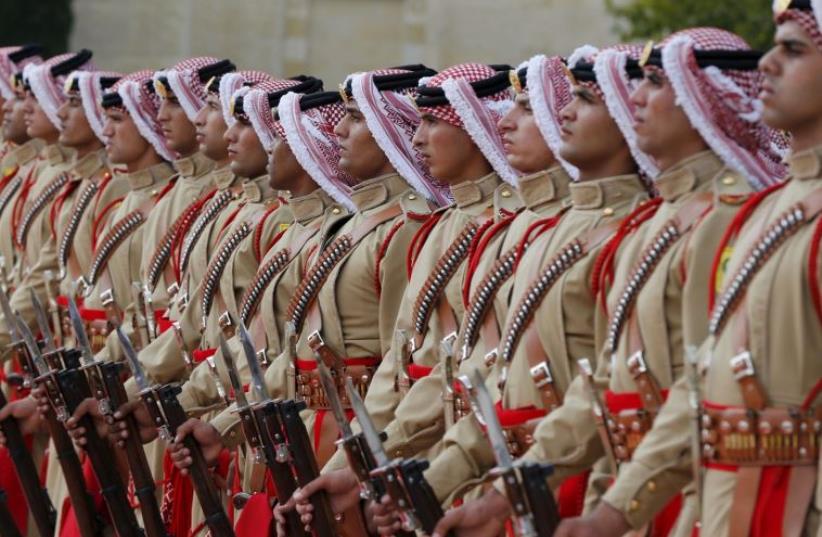 An honor guard marches at the Royal Palace in Amman, Jordan (photo credit: REUTERS)