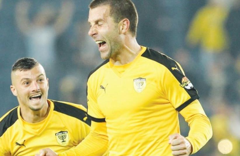 Beitar Jerusalem defender Dusan Matovic celebrates after scoring the winner a victory over Maccabi Netanya at Teddy Stadium (photo credit: DANNY MARON)