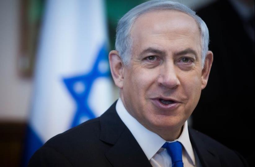 Netanyahu at cabinet meeting (photo credit: YONATAN SINDEL/POOL)