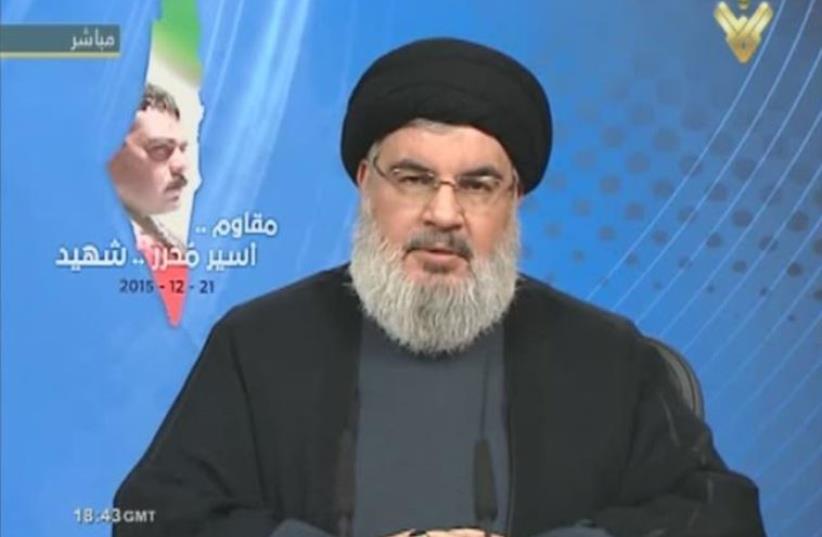 Hezbollah leader Hassan Nasrallah speaking on live television about the death of terrorist Samir Kuntar (photo credit: screenshot)