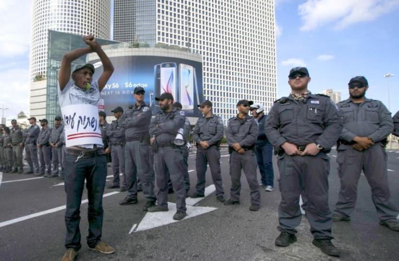 Israelis of Ethiopian origin demonstrated against police racism and brutality, May 3, after a video showing a policeman beating a soldier from the community went viral (photo credit: REUTERS)