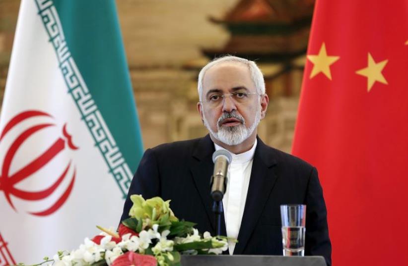 Iranian Foreign Minister Mohammad Javad Zarif at a news conference after meeting with Chinese Foreign Minister Wang Yi in Beijing (photo credit: REUTERS)