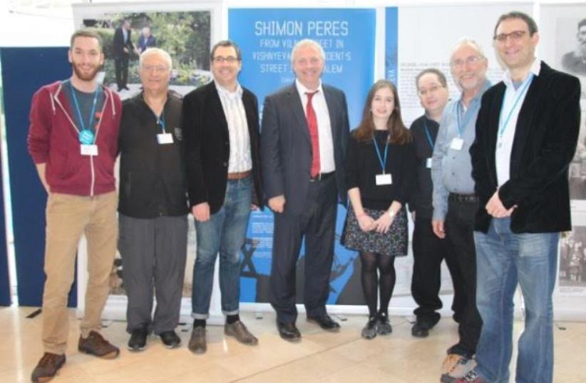 From left: Limmud Conference 2015 Co-Chair Michael Gladstone, Limmud FSU Founder Chaim Chesler, outgoing Limmud Chair Kevin Sefton, MP John Mann, Conference Programming Co-Chair Deborah Blausten, Curator Yoram Dori, and Int'l Steering Committee Chair David Bilchitz (photo credit: COURTESY OF BATIA DORI)