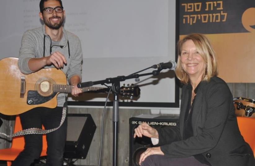 AMERICAN SONGSMITH Bonnie Hayes seen here with an Israeli music student at the Rimon School of Music in Ramat Hasharon. (photo credit: Courtesy)