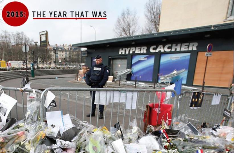 A memorial for the slain victims of the Hyper Cacher kosher supermarket attack in Paris last January. Due to the sensitive nature of his personal story, Oualid declined to be photographed for this piece (photo credit: REUTERS,JPOST STAFF)