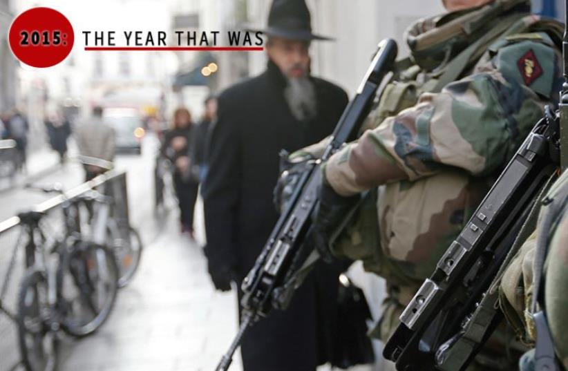 French soldiers patrol the street in a Jewish neighborhood near a religious school and a synagogue as part of the highest level of the ‘Vigipirate’ security plan put in place after the terrorist attacks in Paris (photo credit: REUTERS,JPOST STAFF)