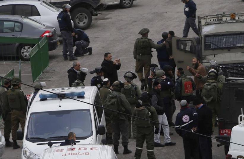 Scene of shooting attack near the Cave of the Patriarchs (Tzabam News) (photo credit: REUTERS)