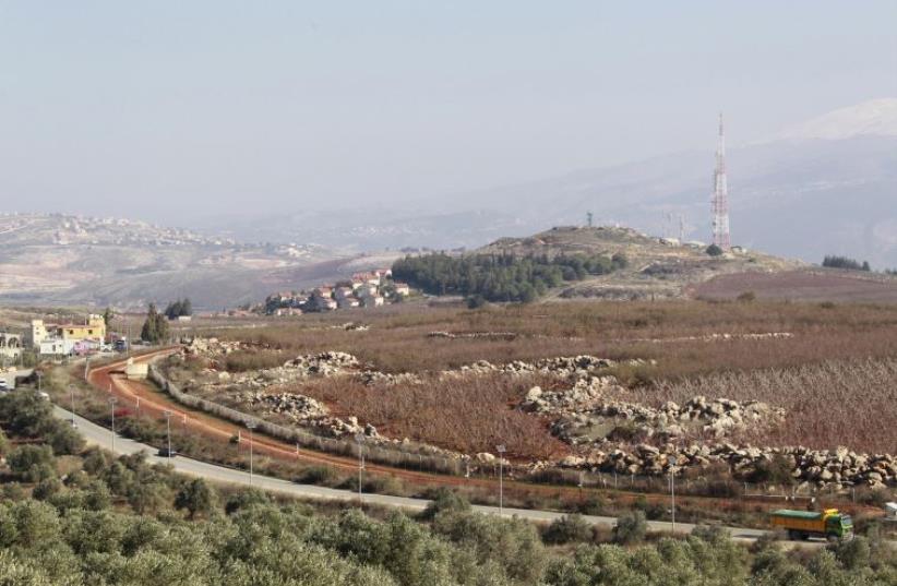 A general view shows the Lebanese-Israeli border as seen from Kfar Kila village, southern Lebanon December 21, 2015 (photo credit: REUTERS)