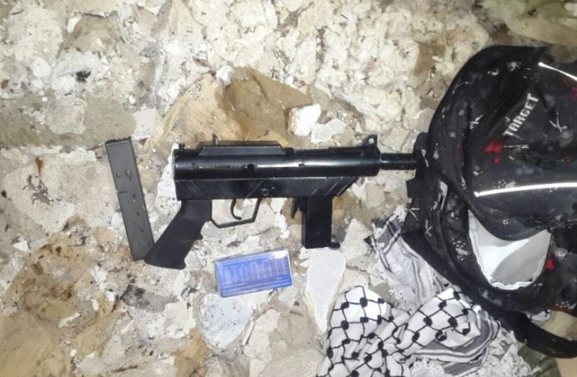 Weapons used by Palestinian terror cell that attacked IDF soldiers (photo credit: SHIN BET)