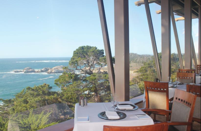 DINING IN Pacific’s Edge Restaurant comes  with majestic views of Point Lobos.  (photo credit: GEORGE MEDOVOY)