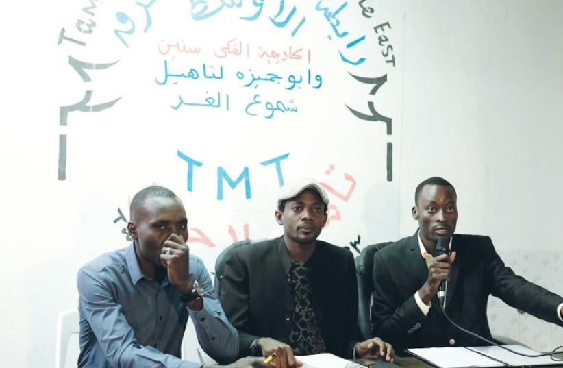 REPRESENTATIVES OF the Sudanese community speak to reporters in south Tel Aviv yesterday. (photo credit: FLASH90)