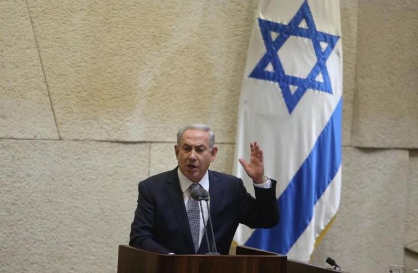 Prime Minister Benjamin Netanyahu addresses the Knesset in Jerusalem (photo credit: MARC ISRAEL SELLEM)