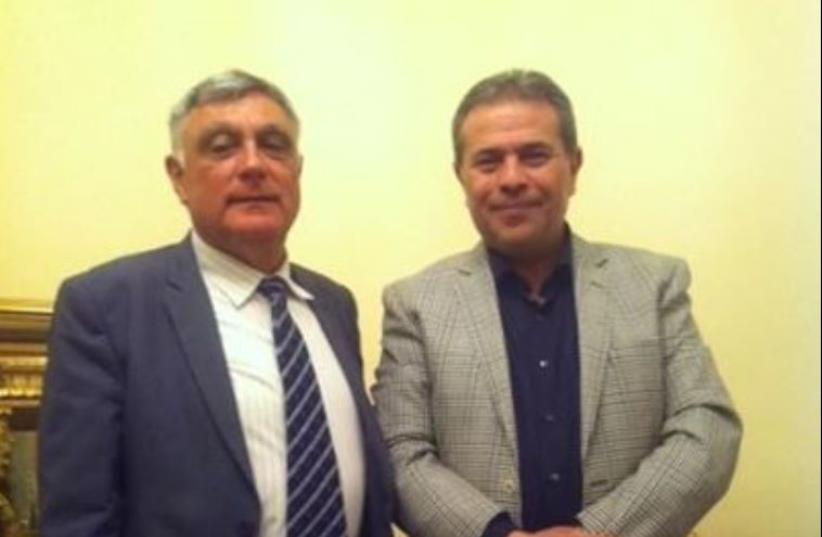 MP Tawfik Okasha (right) hosts Israeli ambassador Haim Koren (photo credit: EGYPTIAN MEDIA)