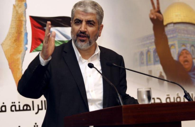 Hamas leader Khaled Meshaal speaks during a news conference in Doha, Qatar (photo credit: REUTERS)
